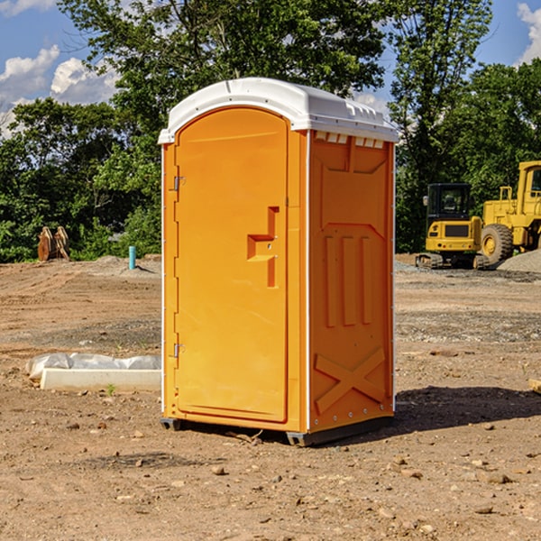 how often are the porta potties cleaned and serviced during a rental period in Bowler